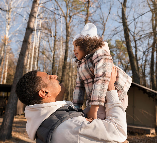 Father Lifting Daughter in Autumn Woods Father Lifting Daughter in Autumn Woods  Steven H. Snyder & Associates Father Lifting Daughter in Autumn Woods  Steven H. Snyder & Associates